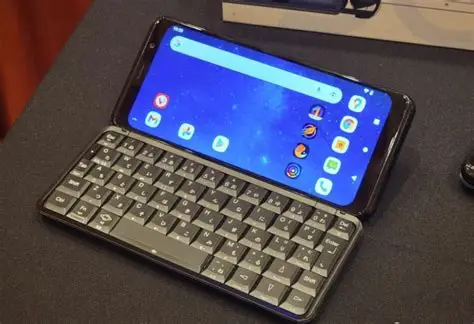 A modern smartphone with a physical keyboard displayed beside wireless touchscreen devices.