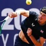 Toby Samuel celebrating his French Open qualification match victory.