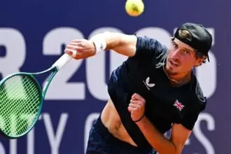 Toby Samuel celebrating his French Open qualification match victory.