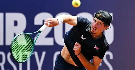 Toby Samuel celebrating his French Open qualification match victory.