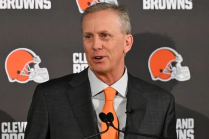 Cleveland Browns head coach Todd Monken watches practice drills during spring offseason workouts at the Browns training facility in 2026.