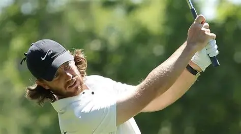 Tommy Fleetwood reacts after playing a shot during the second round of the Truist Championship at Quail Hollow.