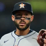 Houston Astros Carlos Correa on crutches with ankle boot after tendon tear injury.