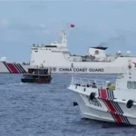 South China Sea dredging war 2026 Antelope Reef China Vietnam island building Paracel Islands