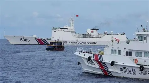 South China Sea dredging war 2026 Antelope Reef China Vietnam island building Paracel Islands