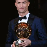 Cristiano Ronaldo Ballon d'Or winner celebrating with one of his five awards