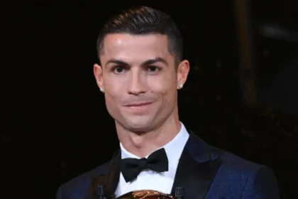 Cristiano Ronaldo Ballon d'Or winner celebrating with one of his five awards