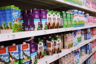 Milk at the back of the store showing supermarket layout customer movement aisles product placement and impulse buying